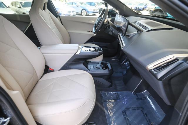 used 2025 BMW iX car, priced at $87,977