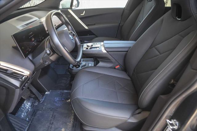 used 2025 BMW iX car, priced at $97,545