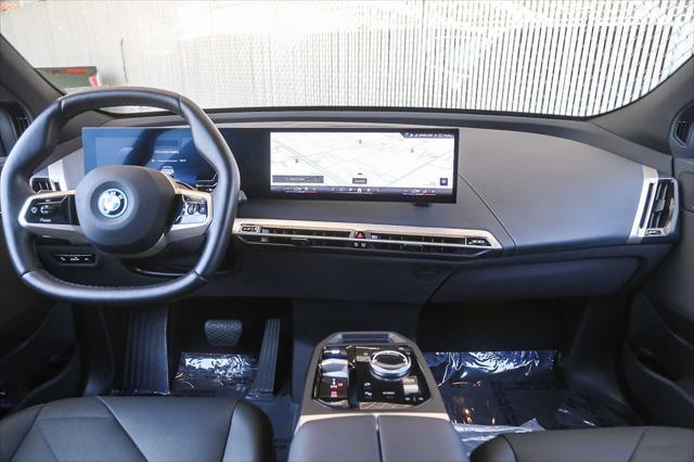used 2025 BMW iX car, priced at $97,545