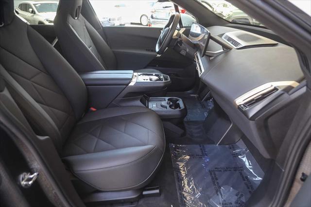 used 2025 BMW iX car, priced at $97,545