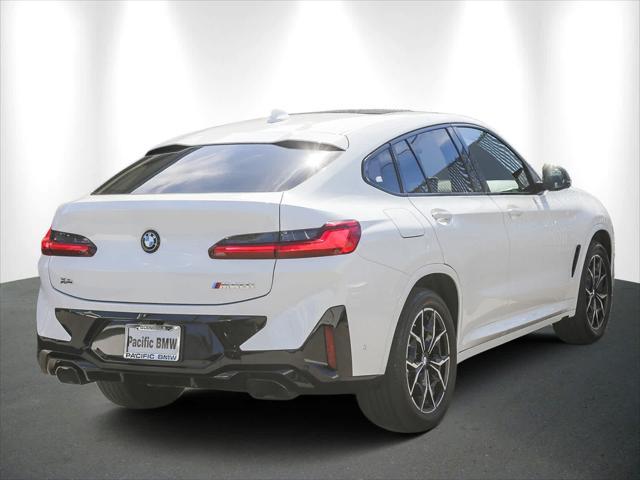 used 2024 BMW X4 car, priced at $59,881