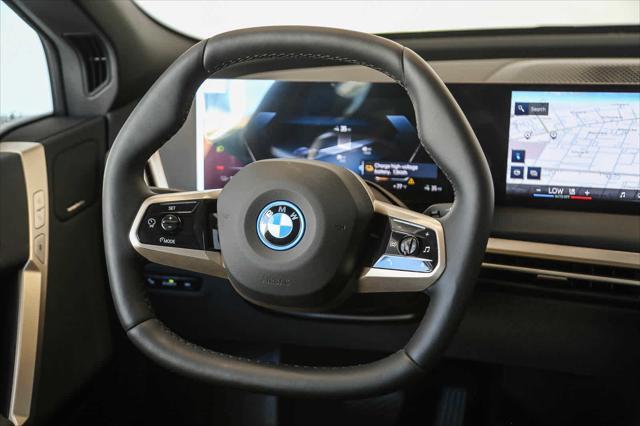 used 2025 BMW iX car, priced at $86,900