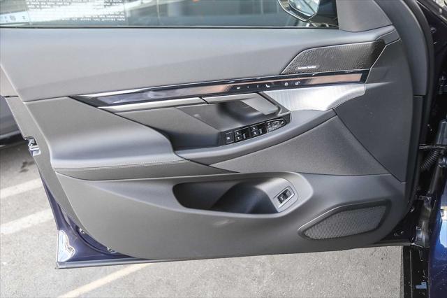new 2026 BMW i5 car, priced at $77,690