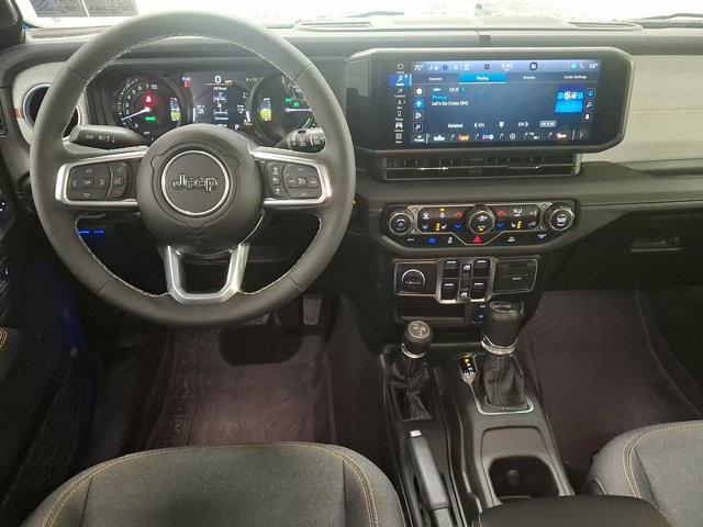 used 2025 Jeep Wrangler car, priced at $45,700