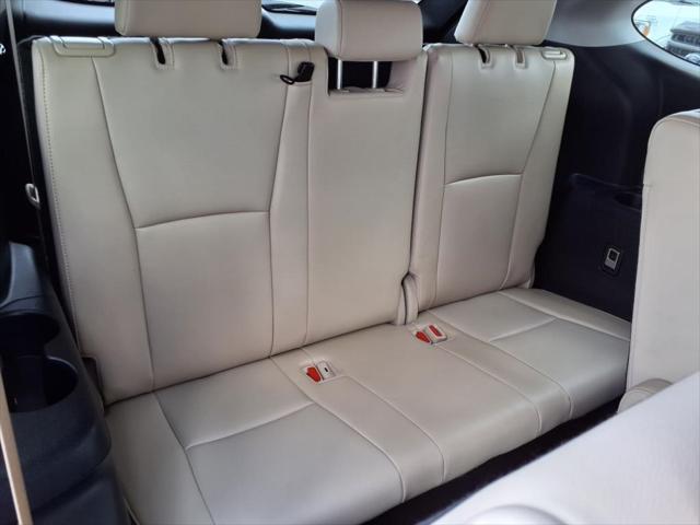used 2022 Toyota Highlander Hybrid car, priced at $44,484