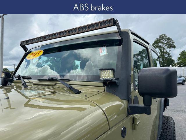 used 2013 Jeep Wrangler car, priced at $14,882