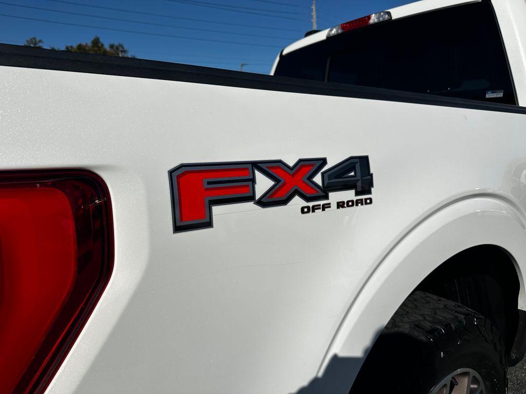 used 2021 Ford F-150 car, priced at $26,221