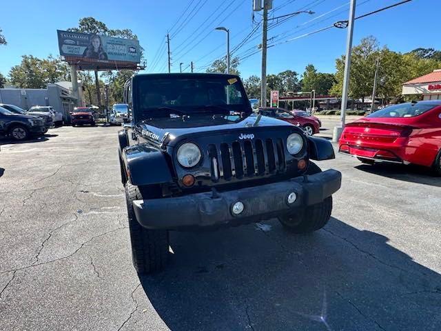 used 2013 Jeep Wrangler Unlimited car, priced at $15,332