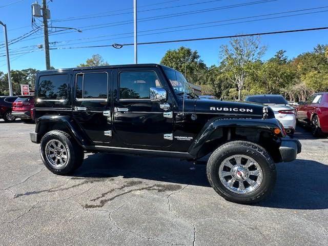 used 2013 Jeep Wrangler Unlimited car, priced at $15,332