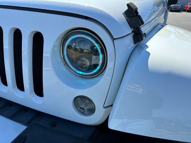 used 2015 Jeep Wrangler Unlimited car, priced at $21,832