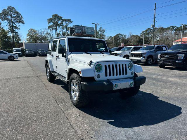 used 2015 Jeep Wrangler Unlimited car, priced at $21,832