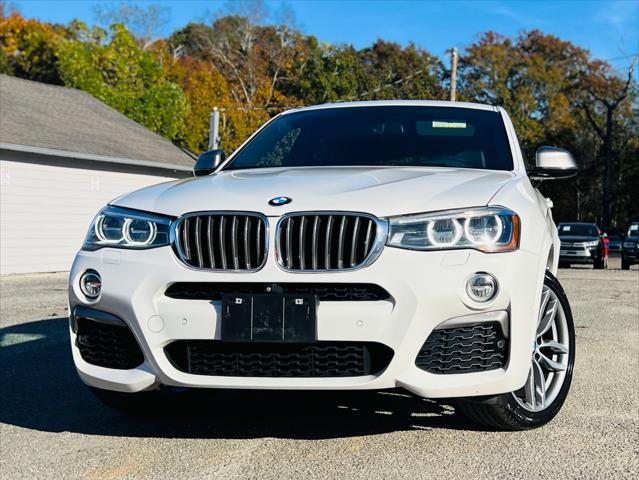 used 2017 BMW X4 car, priced at $19,890