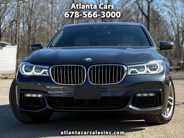 used 2016 BMW 750 car, priced at $22,999