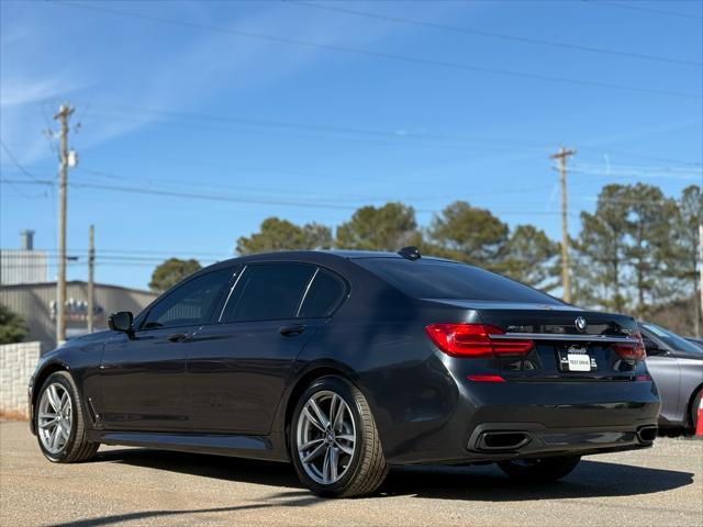 used 2016 BMW 750 car, priced at $22,999