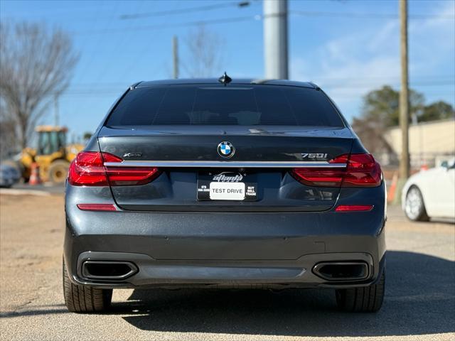 used 2016 BMW 750 car, priced at $22,999