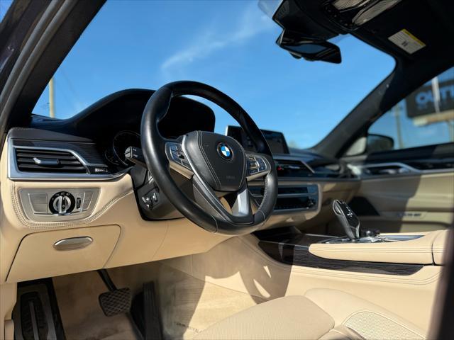 used 2016 BMW 750 car, priced at $22,999