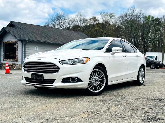 used 2016 Ford Fusion car, priced at $9,990