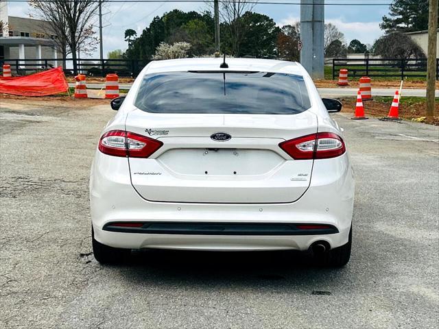 used 2016 Ford Fusion car, priced at $9,990