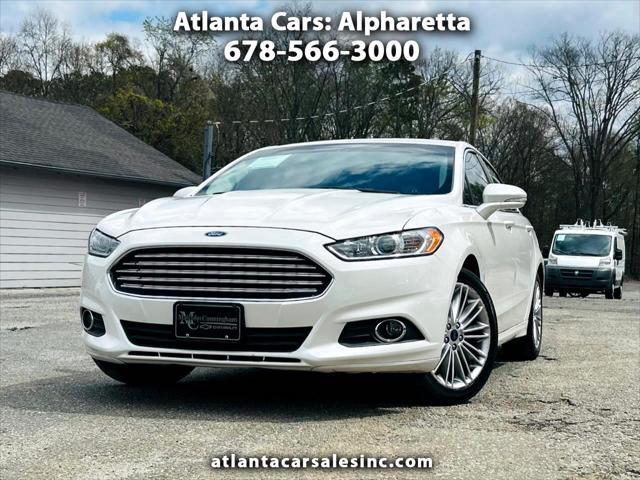 used 2016 Ford Fusion car, priced at $9,990