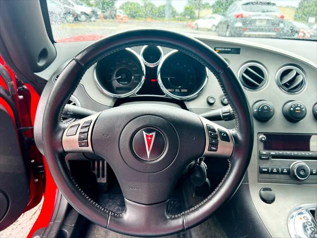 used 2009 Pontiac Solstice car, priced at $12,999