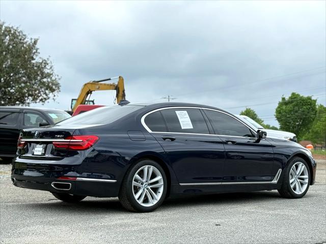 used 2016 BMW 750 car, priced at $22,999