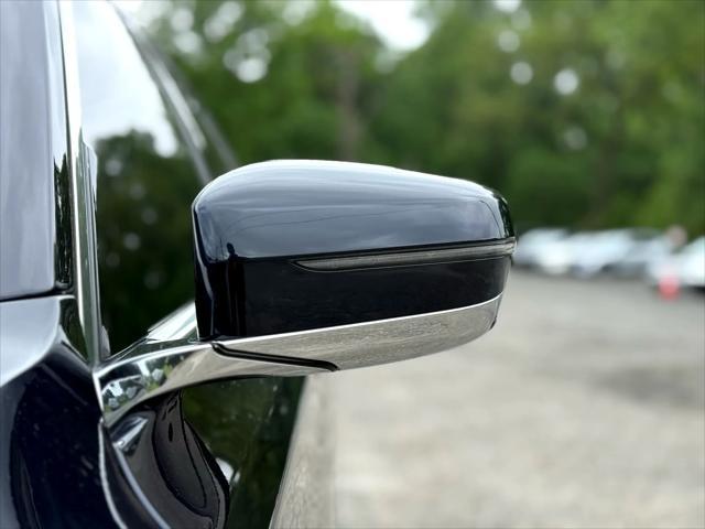 used 2016 BMW 750 car, priced at $22,999