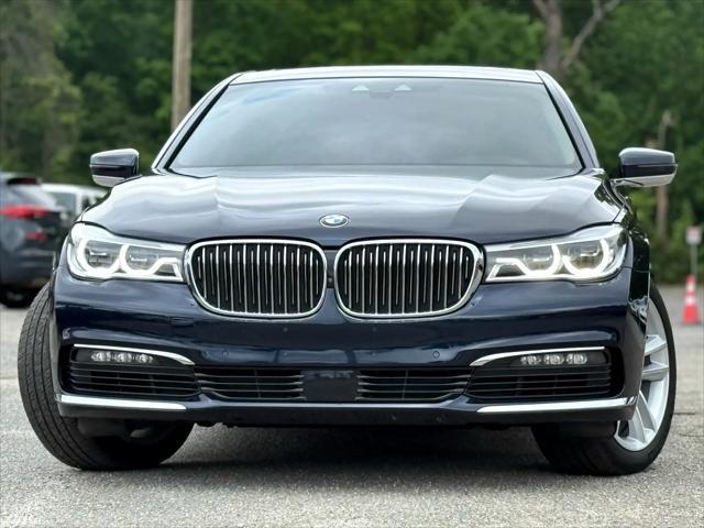 used 2016 BMW 750 car, priced at $22,999