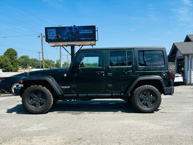 used 2011 Jeep Wrangler Unlimited car, priced at $16,990