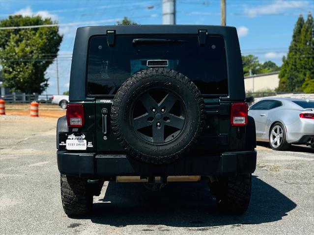 used 2011 Jeep Wrangler Unlimited car, priced at $16,990