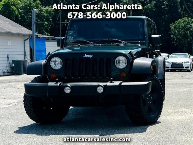 used 2011 Jeep Wrangler Unlimited car, priced at $16,990