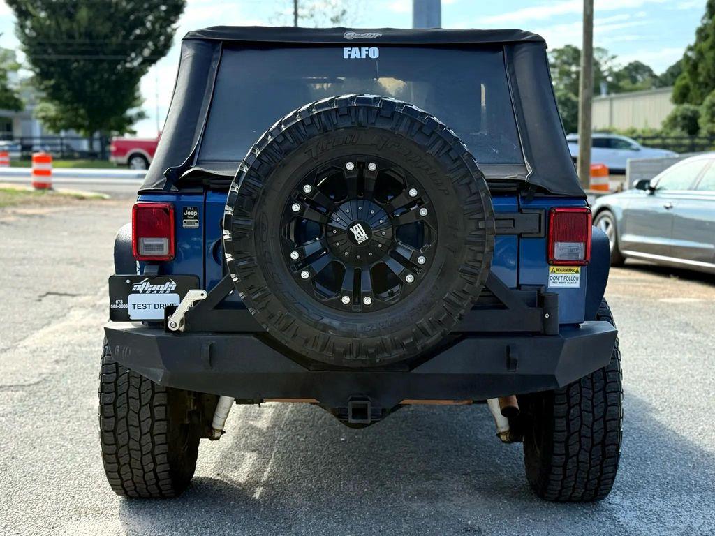 used 2010 Jeep Wrangler Unlimited car, priced at $11,499