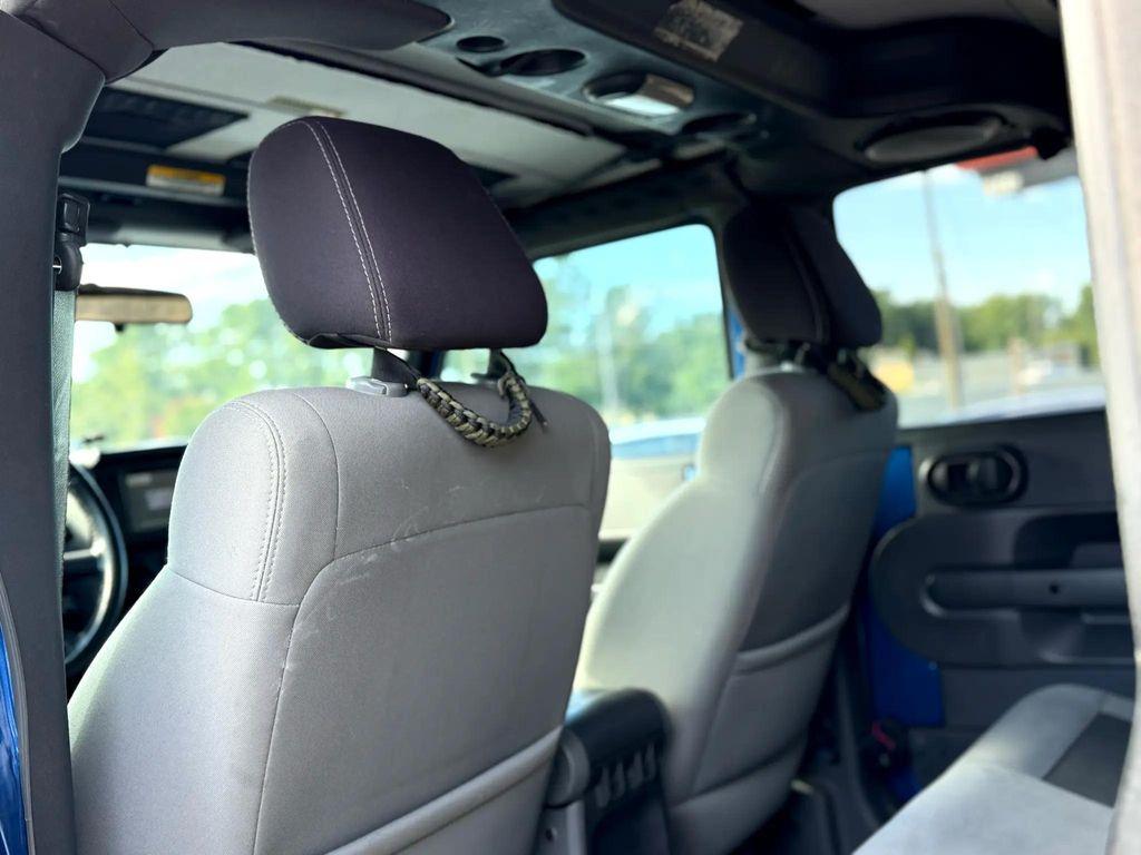 used 2010 Jeep Wrangler Unlimited car, priced at $11,499