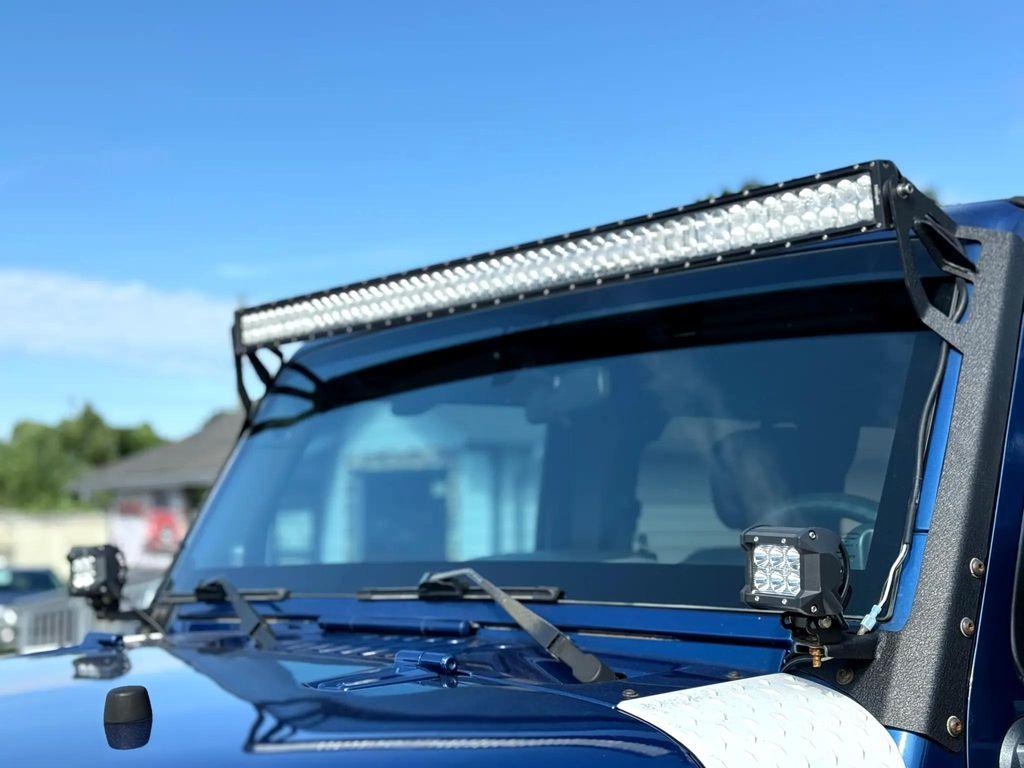 used 2010 Jeep Wrangler Unlimited car, priced at $11,499