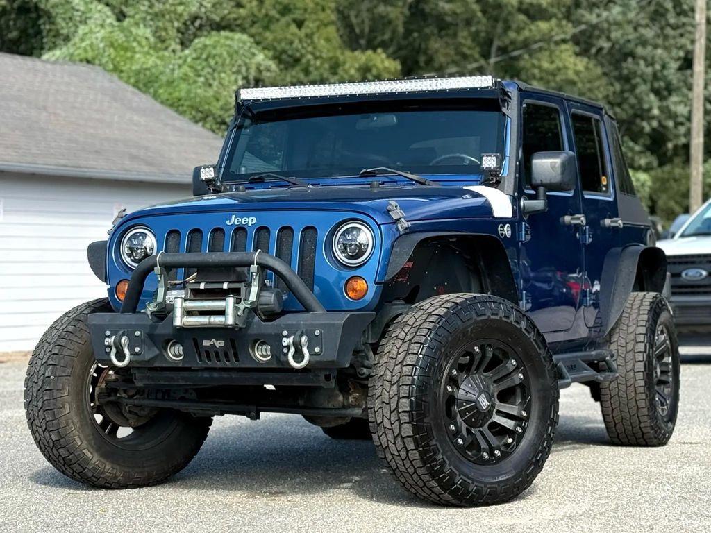 used 2010 Jeep Wrangler Unlimited car, priced at $11,499