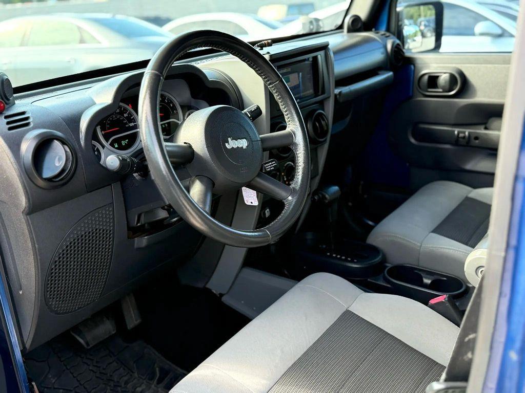 used 2010 Jeep Wrangler Unlimited car, priced at $11,499