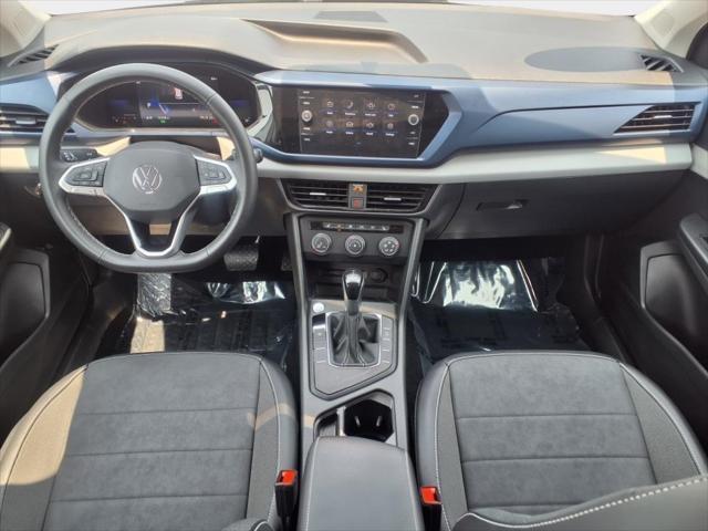 used 2022 Volkswagen Taos car, priced at $18,000