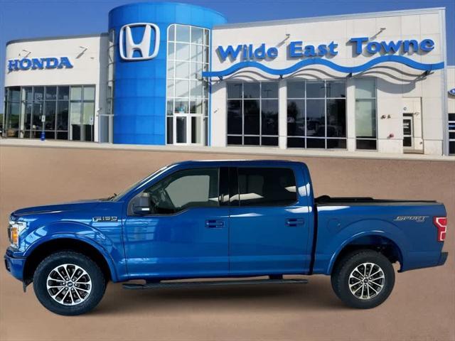 used 2018 Ford F-150 car, priced at $26,827