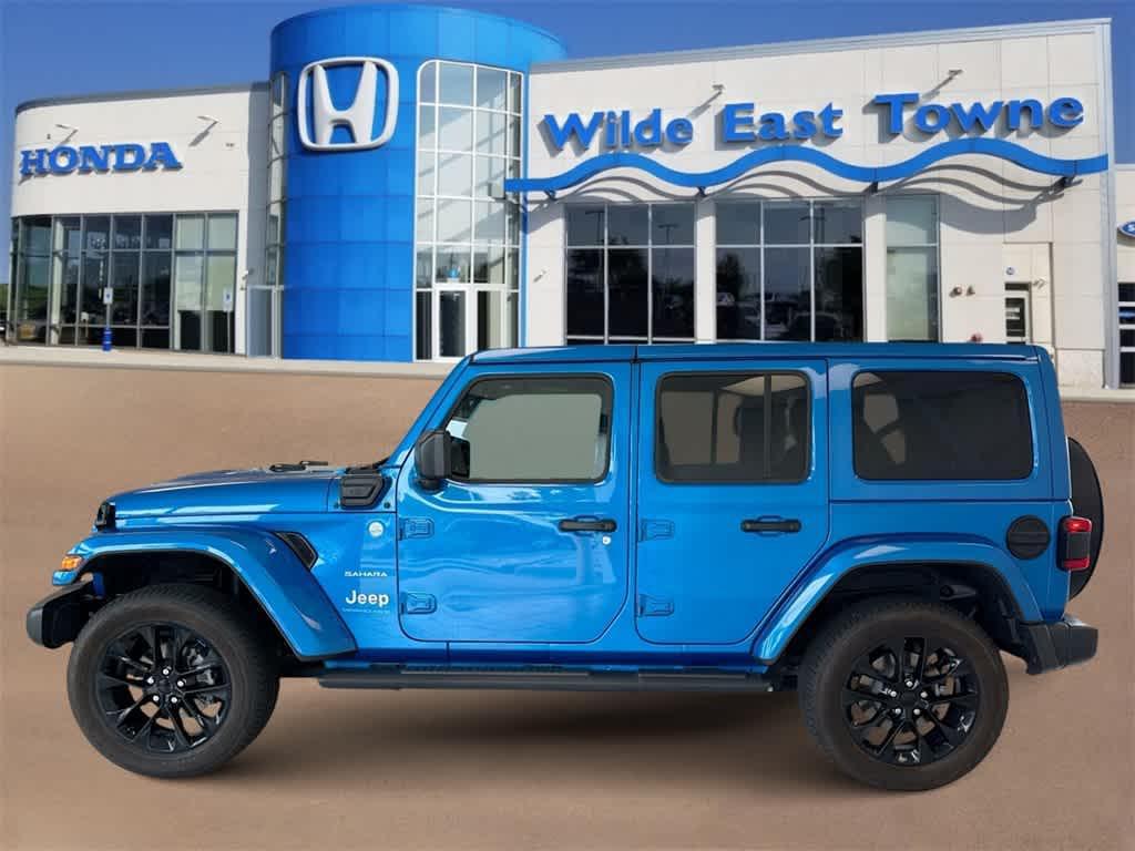 used 2023 Jeep Wrangler 4xe car, priced at $33,838