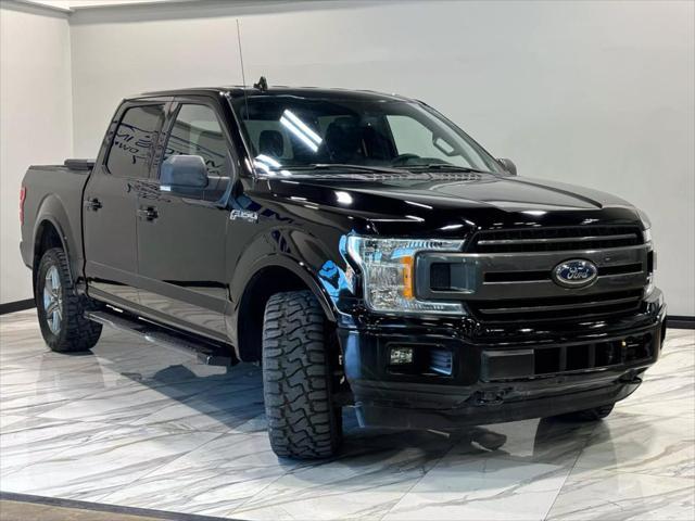 used 2018 Ford F-150 car, priced at $24,495