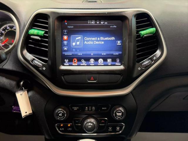 used 2015 Jeep Cherokee car, priced at $12,495
