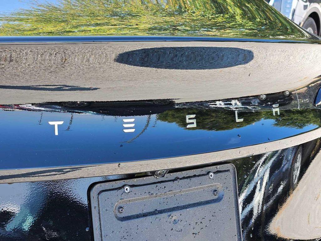 used 2025 Tesla Model 3 car, priced at $32,748