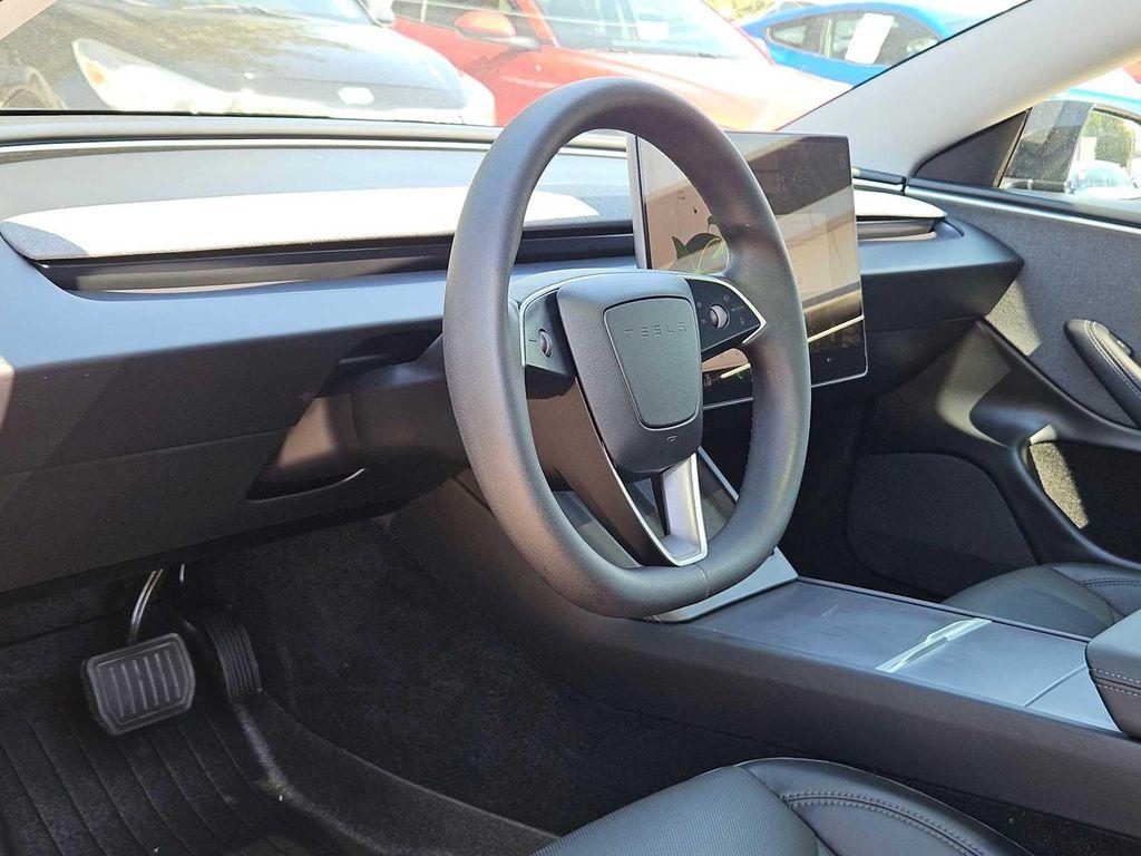 used 2025 Tesla Model 3 car, priced at $32,748
