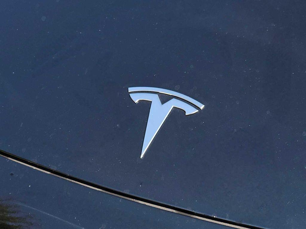 used 2025 Tesla Model 3 car, priced at $32,748