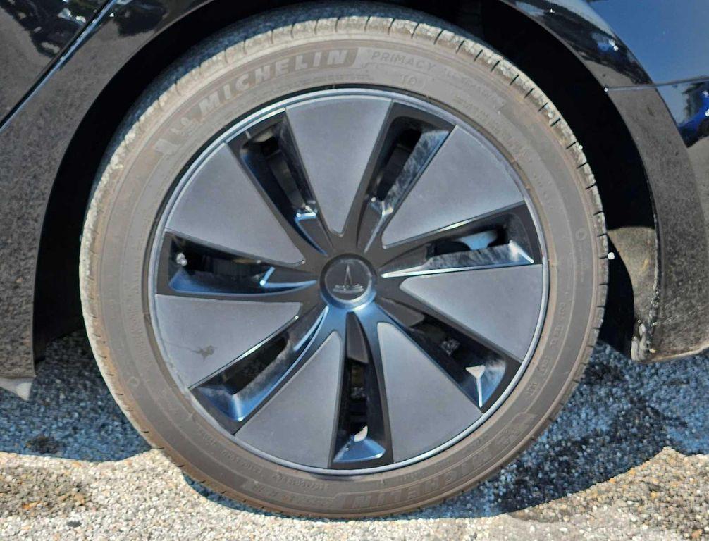 used 2025 Tesla Model 3 car, priced at $32,748