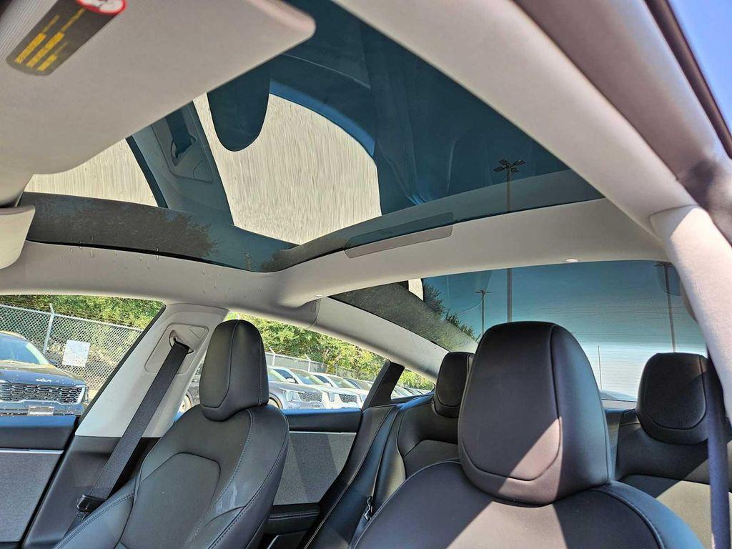 used 2025 Tesla Model 3 car, priced at $32,748