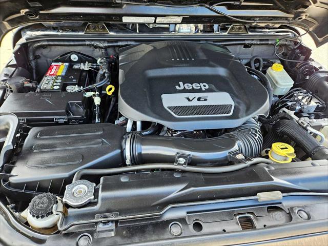 used 2014 Jeep Wrangler Unlimited car, priced at $13,920