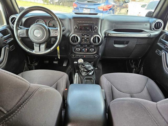used 2014 Jeep Wrangler Unlimited car, priced at $13,920