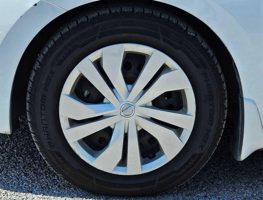 used 2021 Nissan Versa car, priced at $12,000