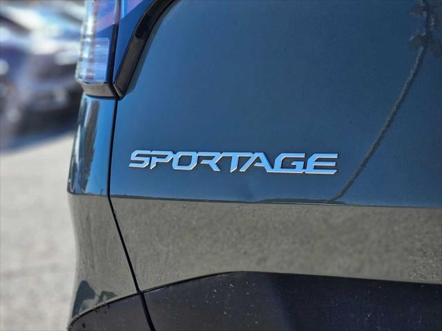 used 2023 Kia Sportage Plug-In Hybrid car, priced at $31,446