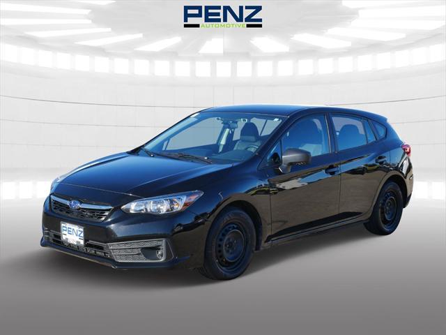 used 2023 Subaru Impreza car, priced at $14,000